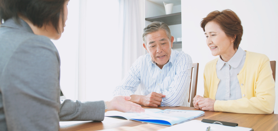 A couple talking to a legal consultant